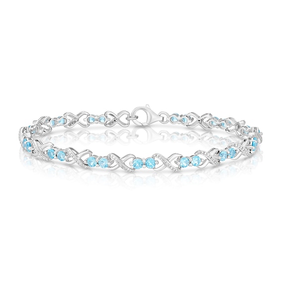 Sterling Silver Diamond and Round Blue Topaz Bracelet
