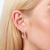 Thumbnail Image 2 of Olivia Burton Rose Gold Plated Silver Logo Huggie Earrings