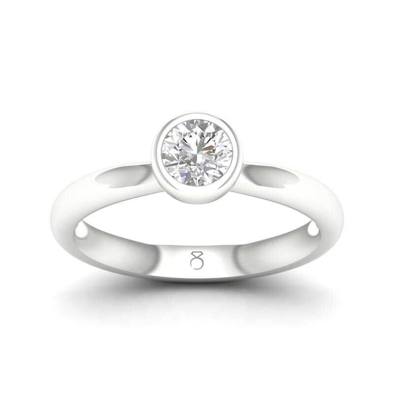 Main Image 1 of The Diamond Story 18ct White Gold Rub Over Solitaire 0.50ct Diamond Ring