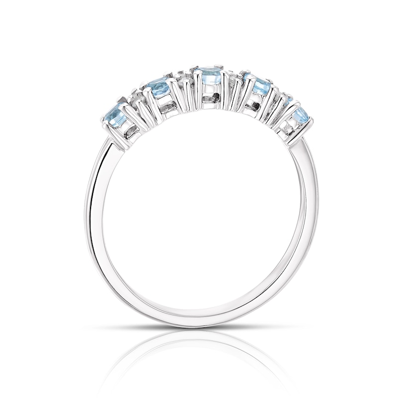 9ct White Gold Blue Topaz & 0.07ct Diamond Eternity Ring
