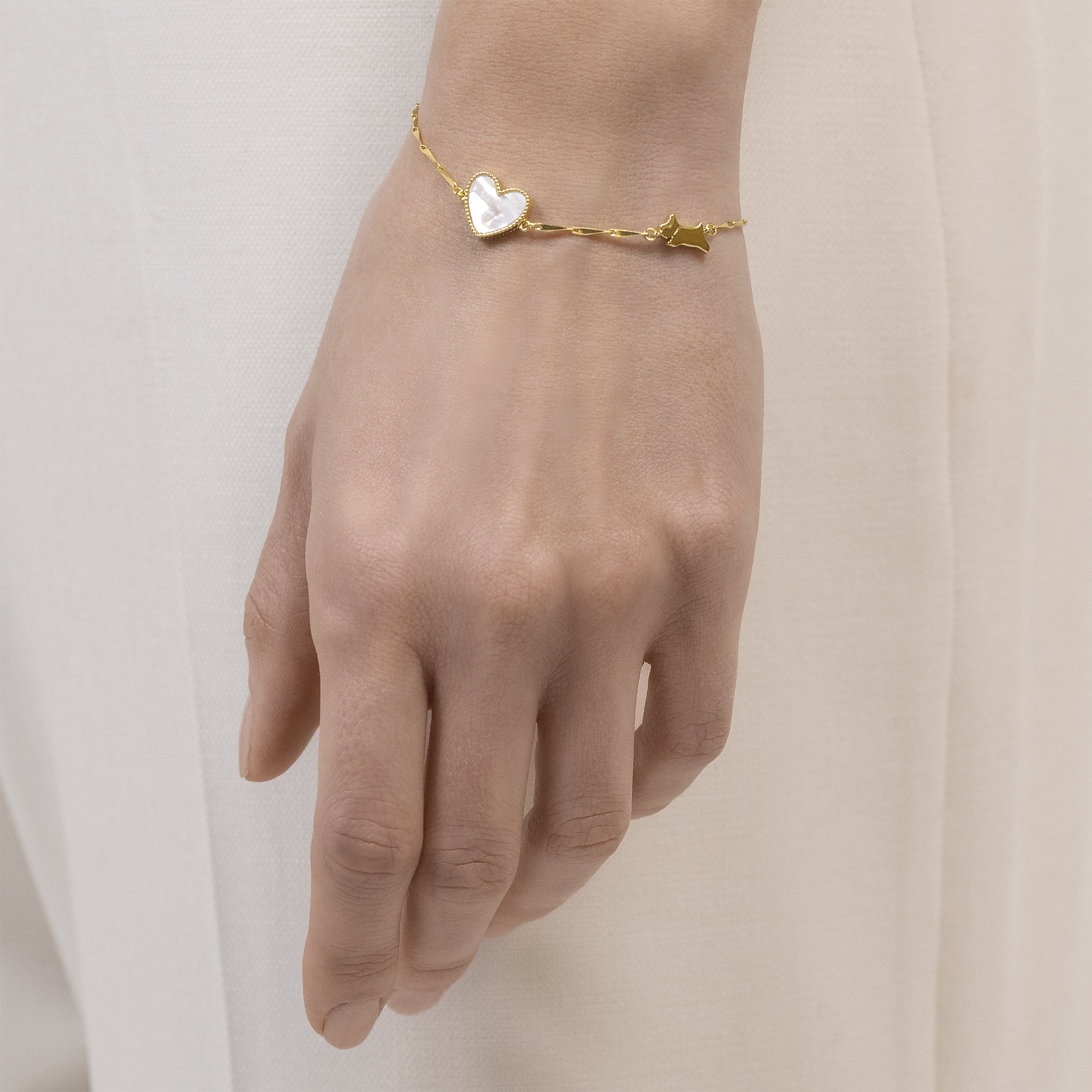 Thumbnail Image 3 of Radley 18ct Gold Plated Mother Of Pearl Heart & Jumping Dog Bracelet