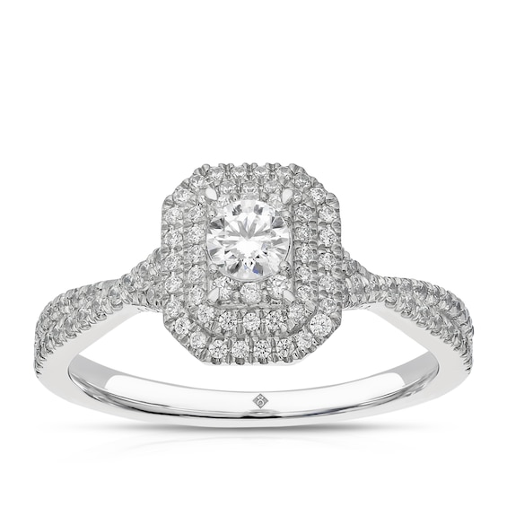 The Diamond Story Platinum 0.50ct Diamond Emerald Cluster Ring