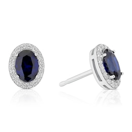 Sterling Silver Platinum Plated Blue Oval Cut Cubic Zirconia Stud Earrings